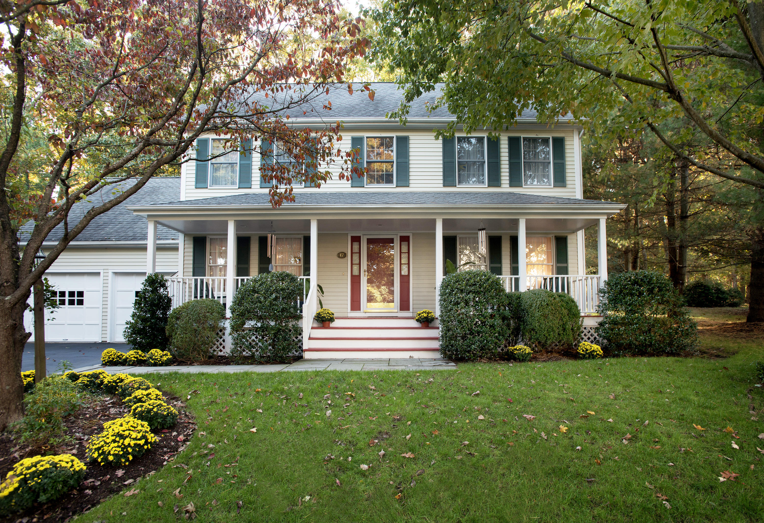 front view of a house with a yard