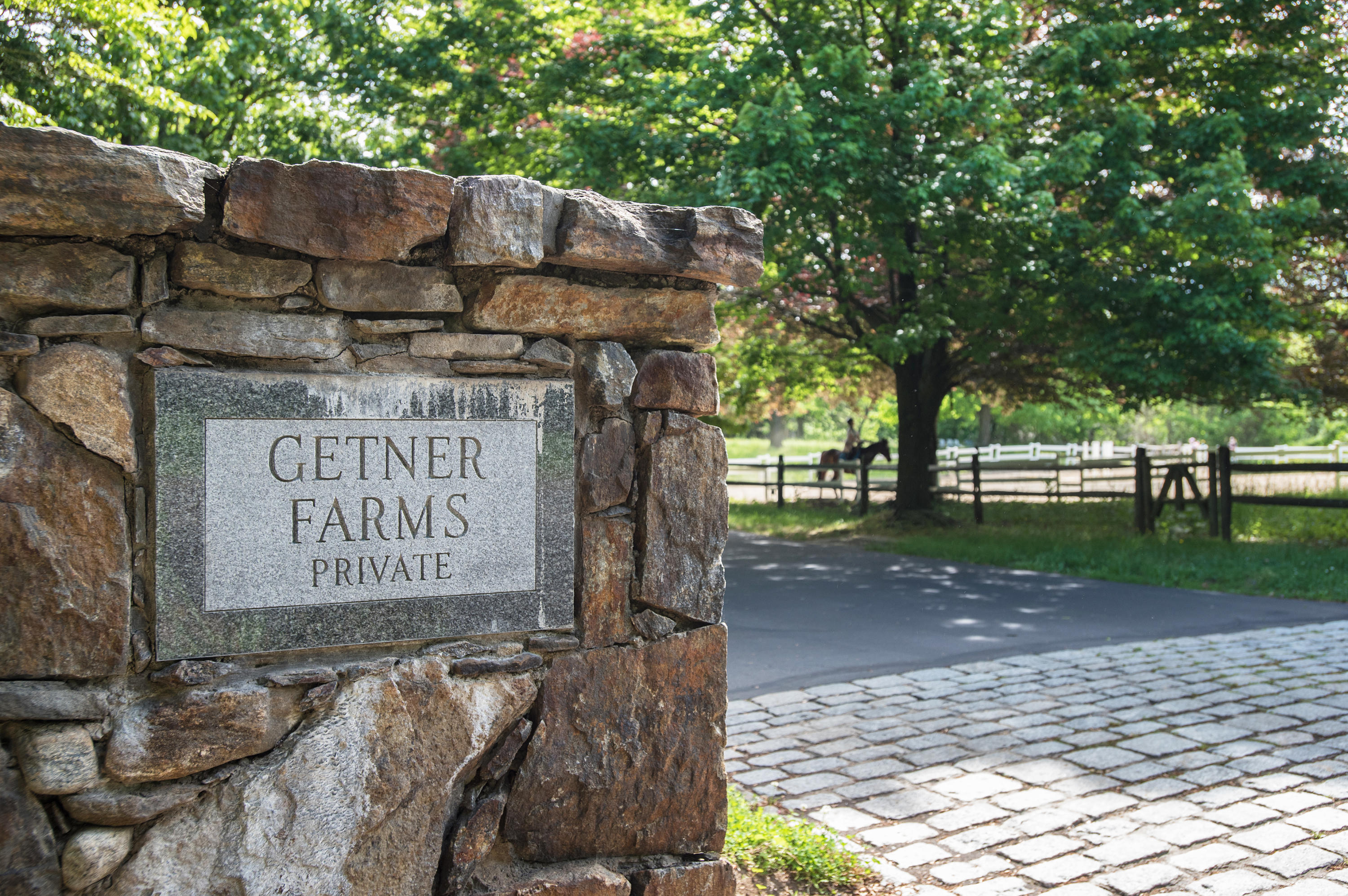 17 Getner Trail, Unit 17 Norwalk, CT 06854 - Photo 2 of 33 a sign on the side of a road