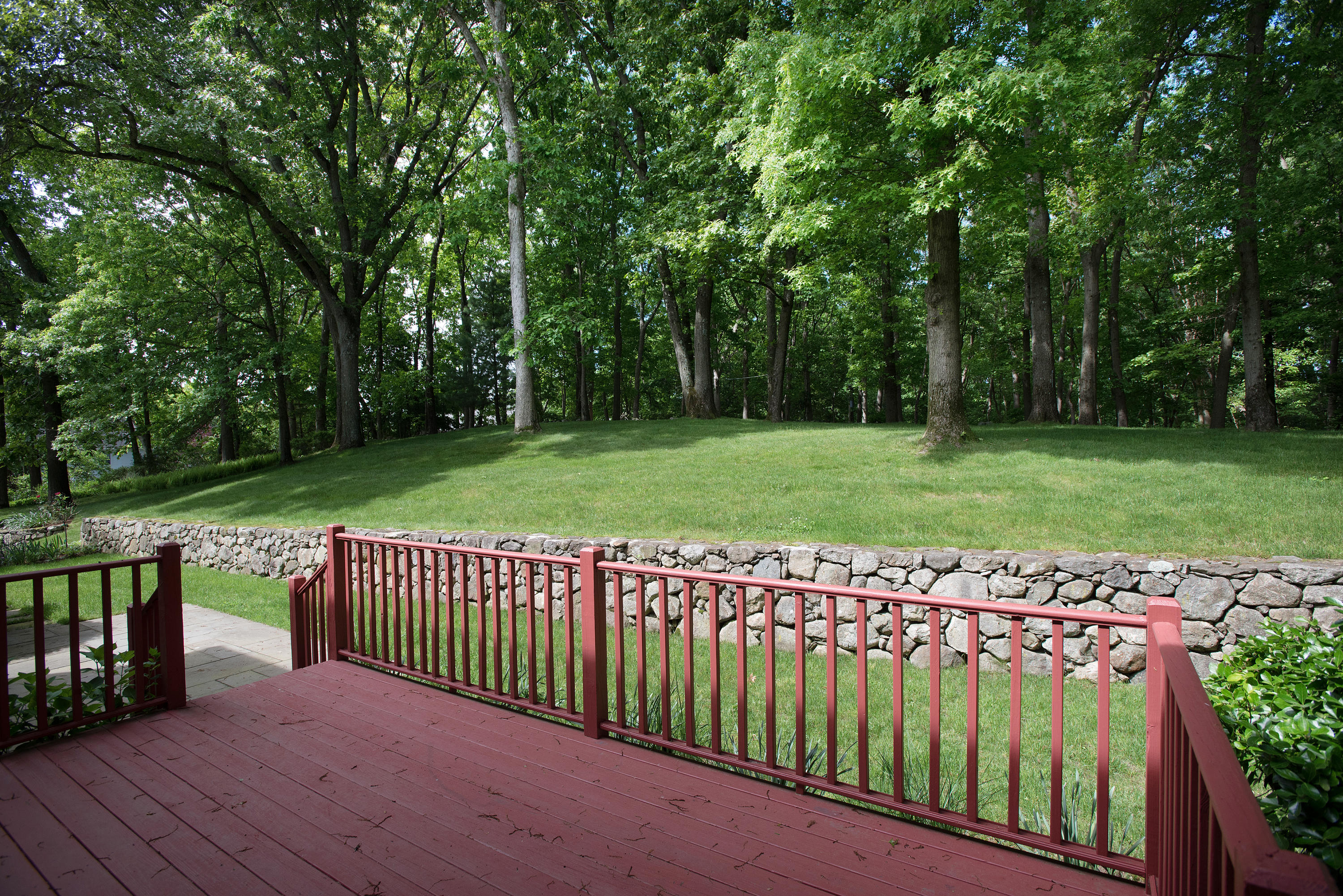 17 Getner Trail, Unit 17 Norwalk, CT 06854 - Photo 30 of 33 a view of a deck with a yard