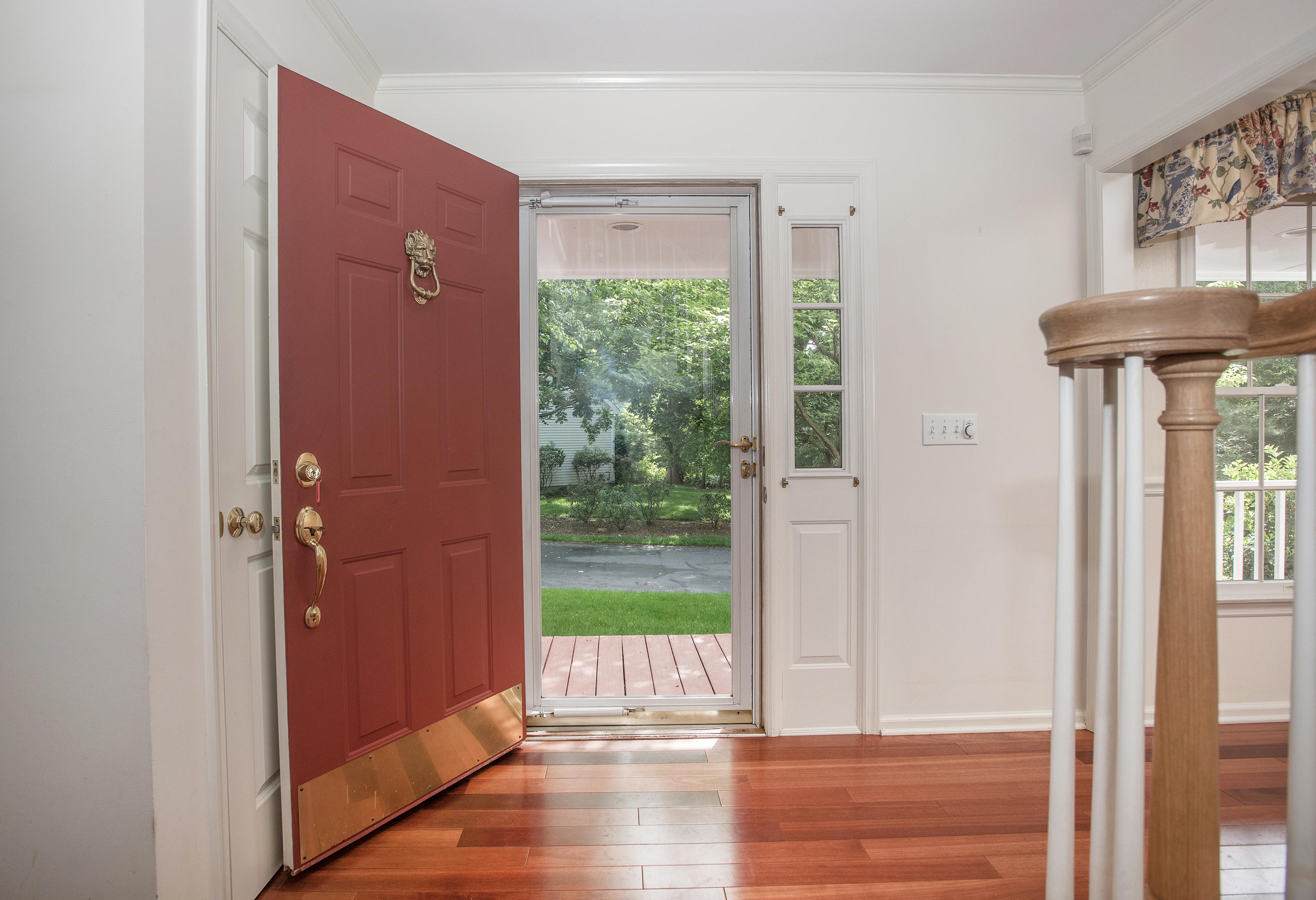 17 Getner Trail, Unit 17 Norwalk, CT 06854 - Photo 5 of 33 a view of a hallway with a door and wooden floor