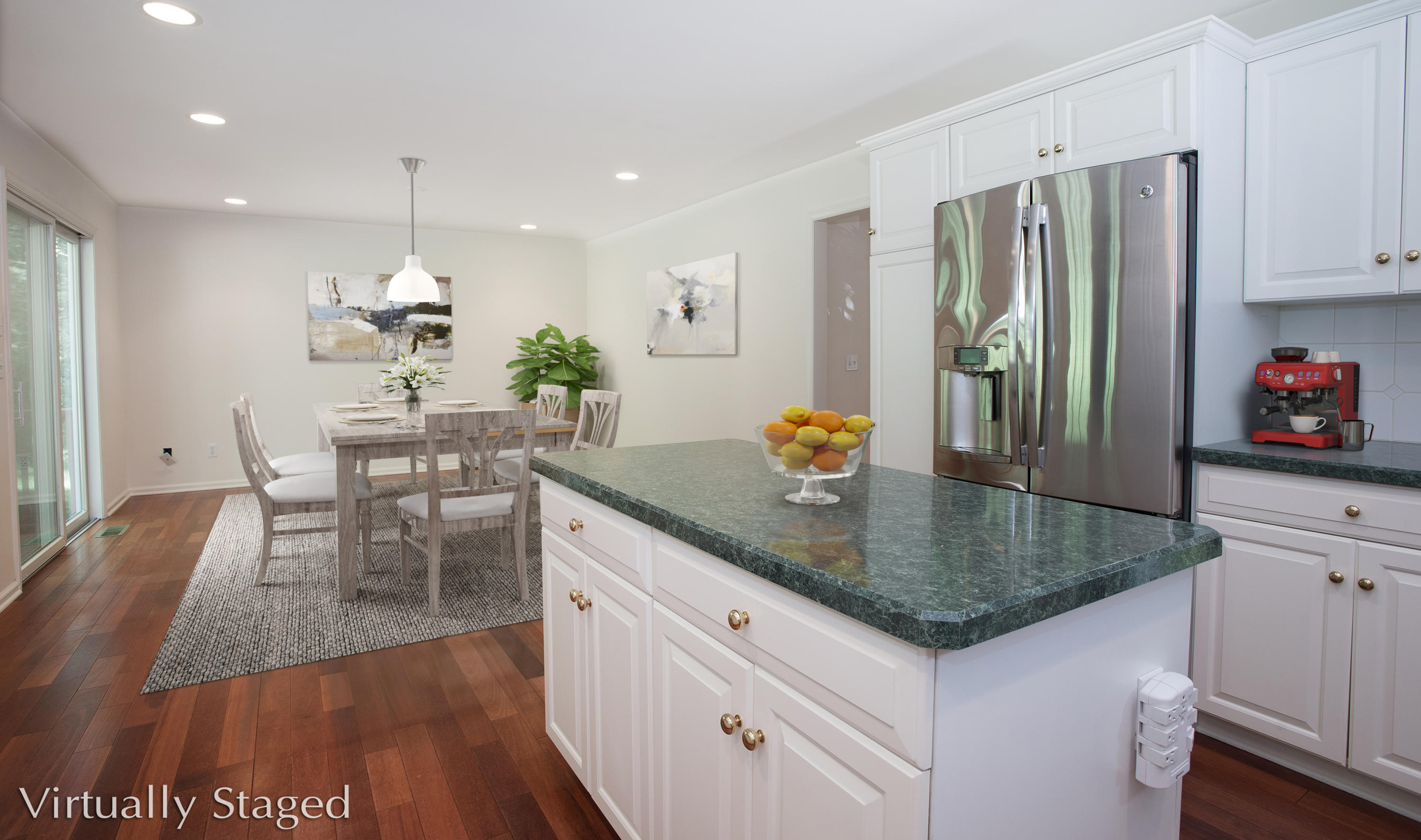 17 Getner Trail, Unit 17 Norwalk, CT 06854 - Photo 7 of 33 a kitchen with stainless steel appliances granite countertop a sink a stove a dining table and chairs