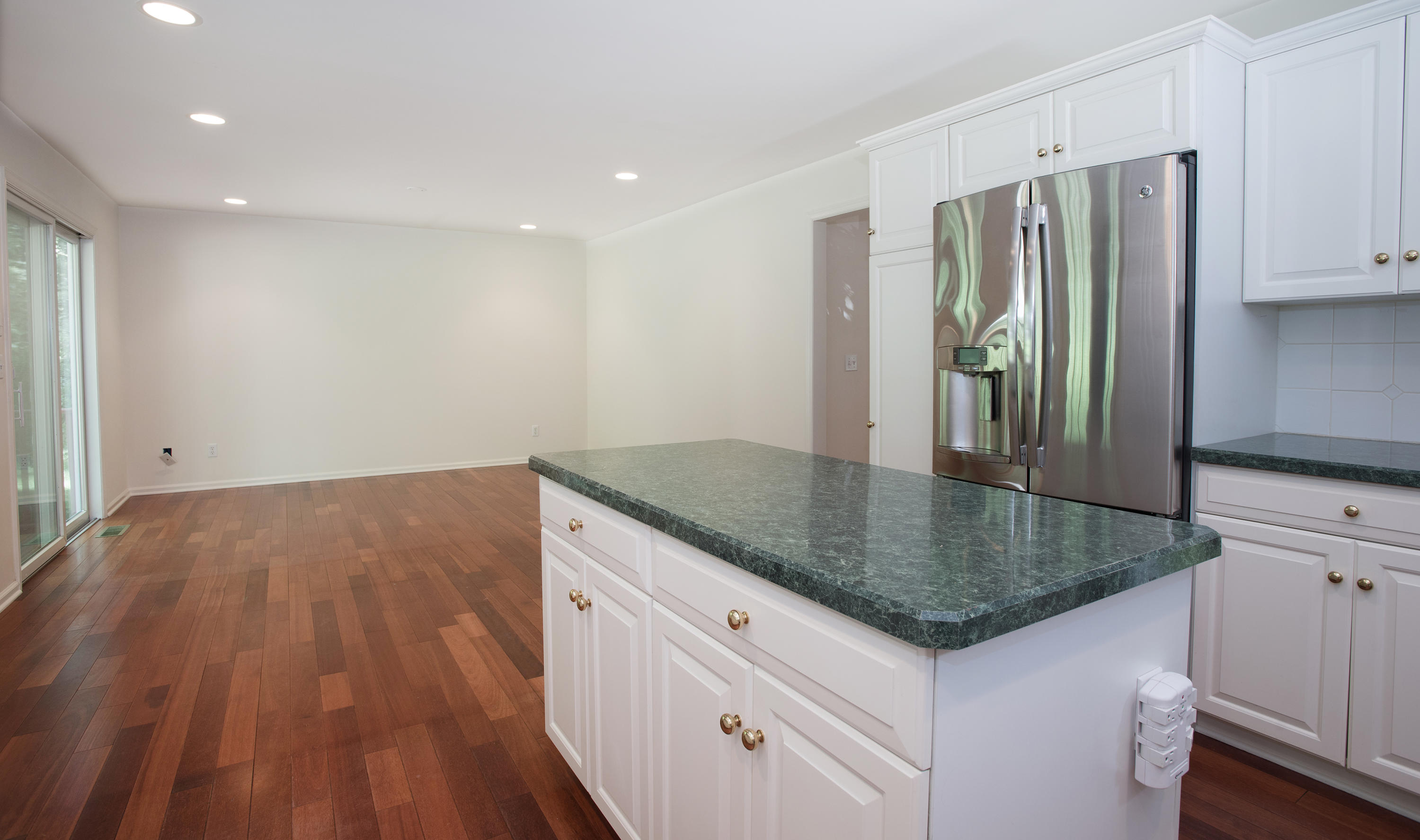 17 Getner Trail, Unit 17 Norwalk, CT 06854 - Photo 8 of 33 a kitchen with stainless steel appliances granite countertop a refrigerator and a sink