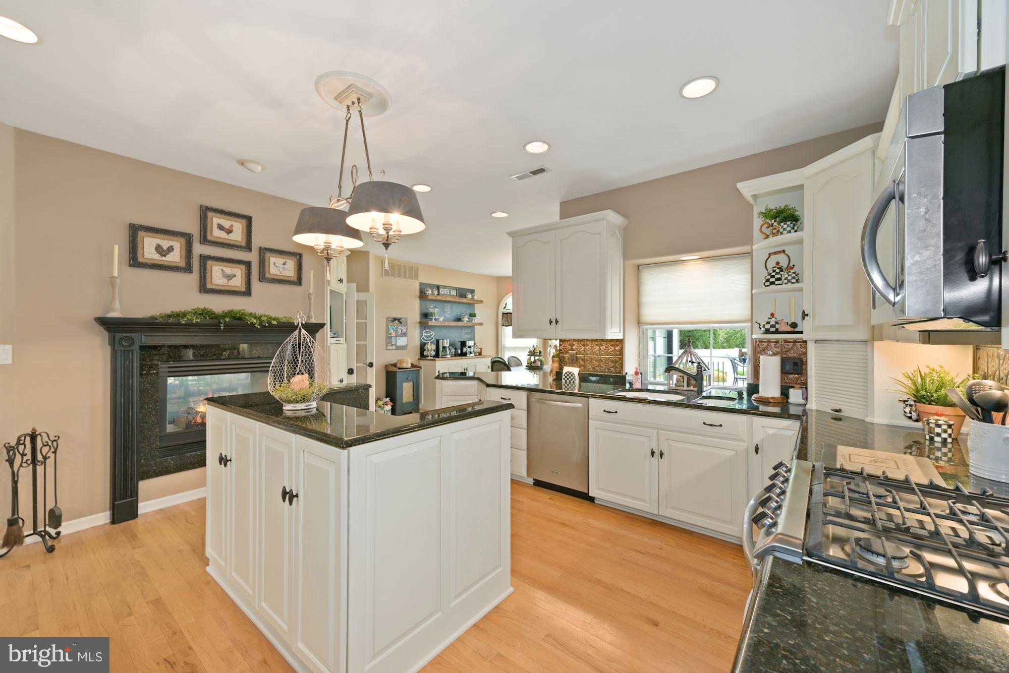 360 Chapel Heights Road Sewell, NJ 08080 - Photo 20 of 58 a kitchen with granite countertop a sink stove top oven and refrigerator