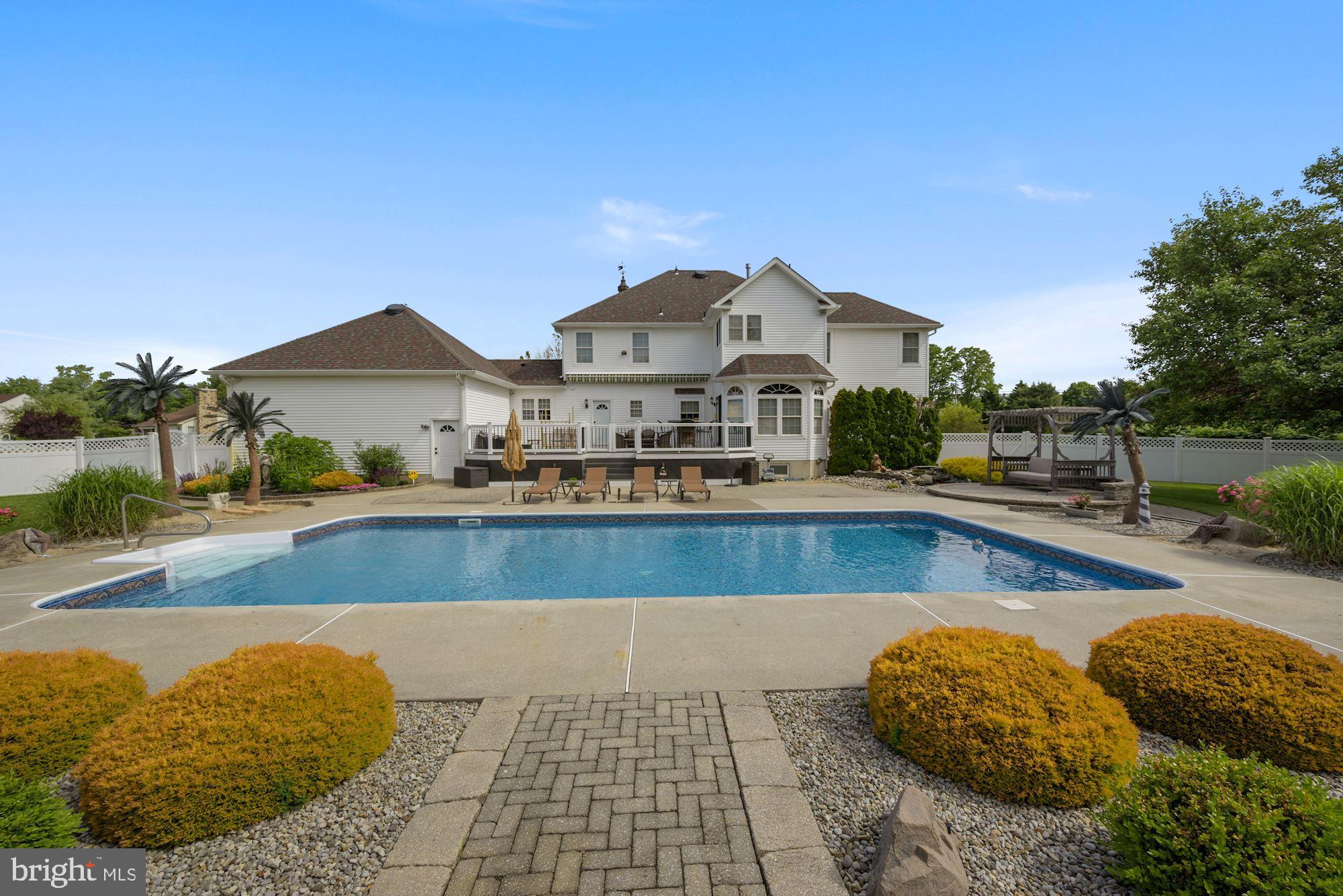360 Chapel Heights Road Sewell, NJ 08080 - Photo 54 of 58 a view of a house with a swimming pool