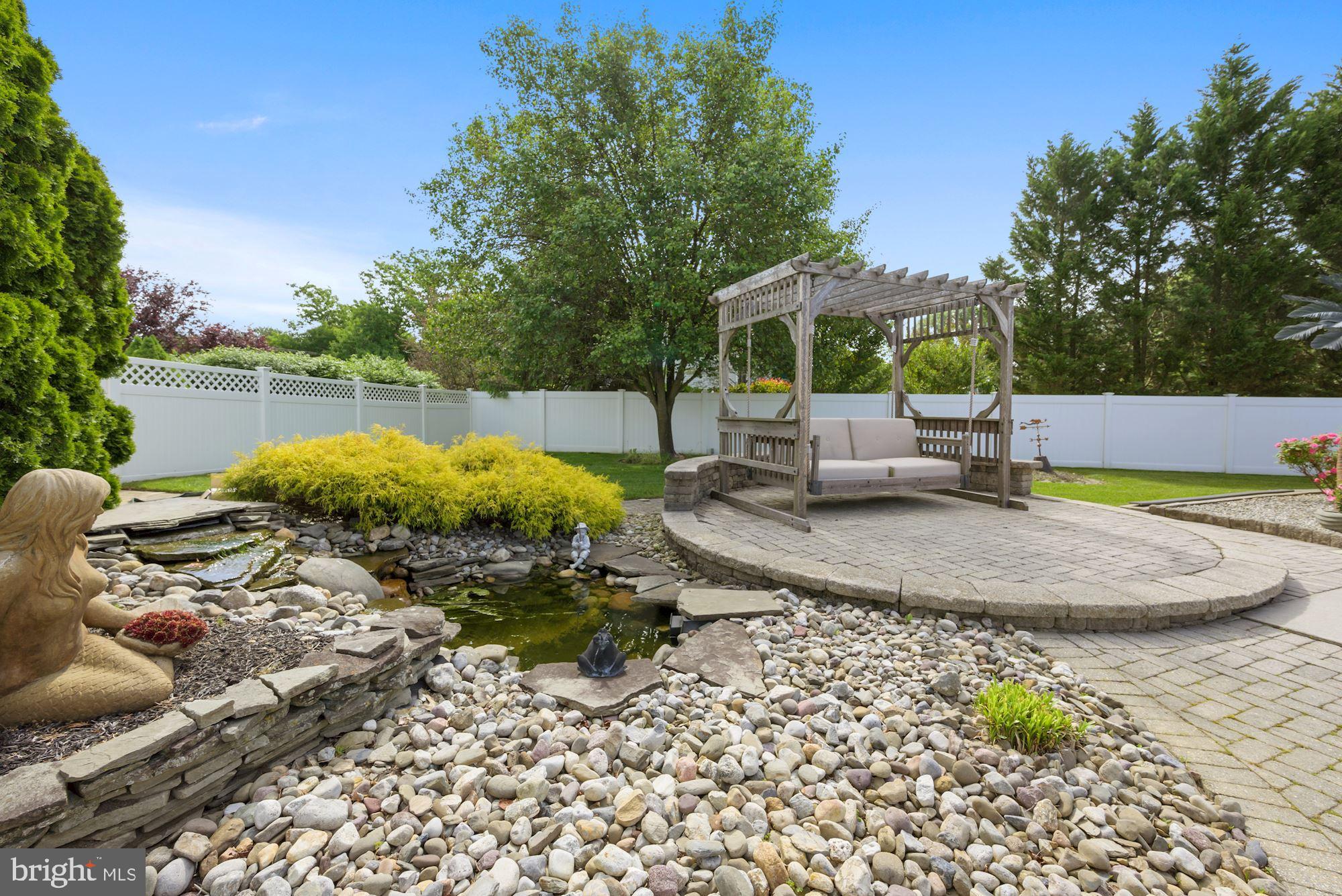360 Chapel Heights Road Sewell, NJ 08080 - Photo 56 of 58 a view of a house with a yard and sitting area