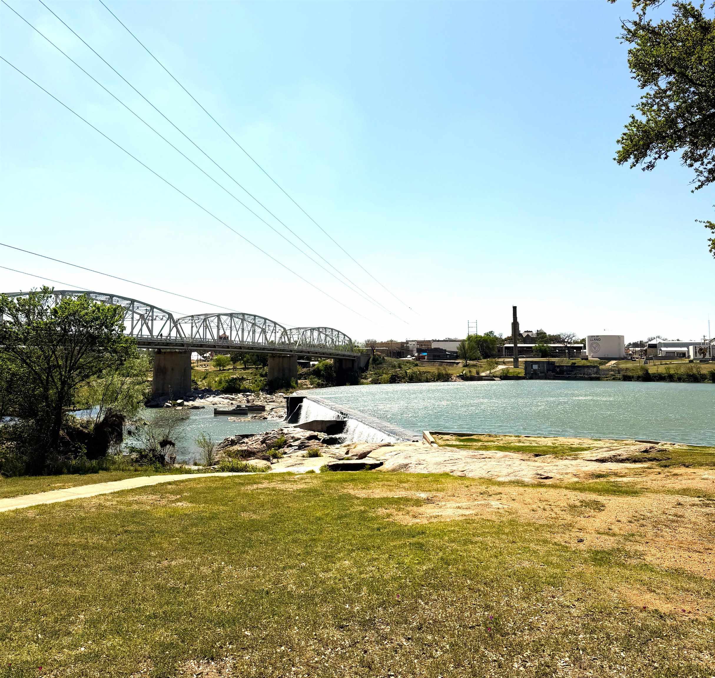 0 East Navarro Street Llano, TX 78643 - Photo 5 of 6 a view of a lake with houses