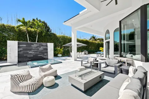 a outdoor living space with patio furniture and a potted plant