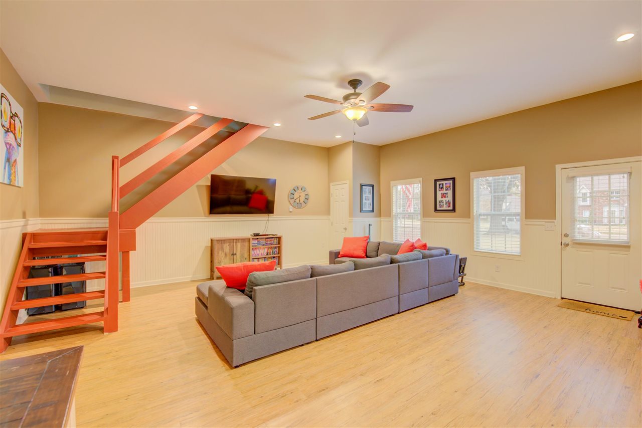 9162 Fox Ridge Road Germantown, TN 38139 - Photo 11 of 25 a living room with furniture and a flat screen tv
