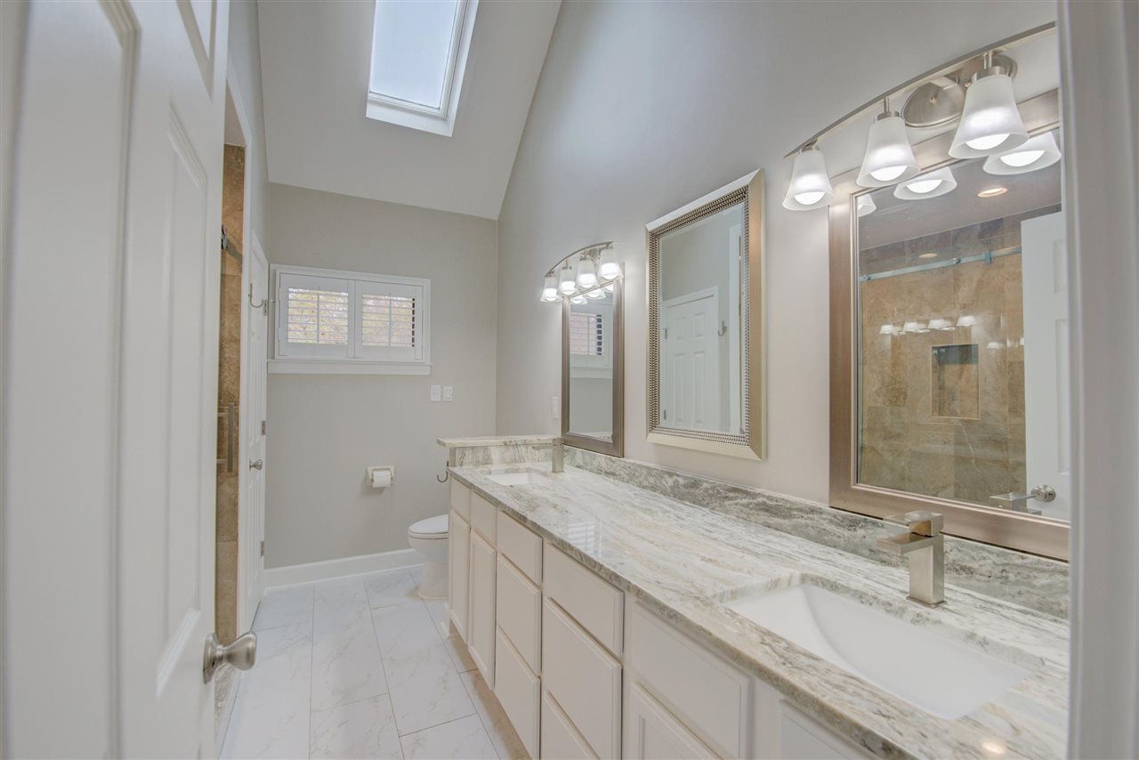 9162 Fox Ridge Road Germantown, TN 38139 - Photo 15 of 25 a bathroom with a sink double vanity and a mirror