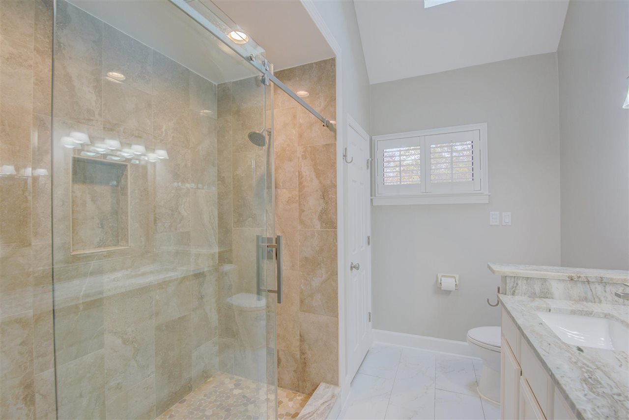 9162 Fox Ridge Road Germantown, TN 38139 - Photo 16 of 25 a bathroom with a shower and a sink