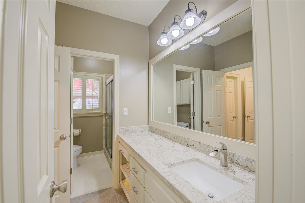 9162 Fox Ridge Road Germantown, TN 38139 - Photo 18 of 25 a spacious bathroom with a double vanity sink and a mirror