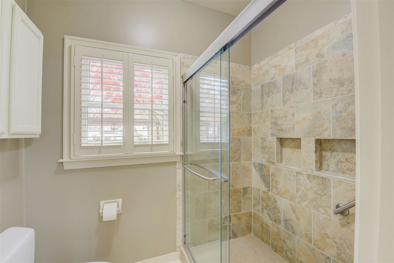 9162 Fox Ridge Road Germantown, TN 38139 - Photo 19 of 25 a bathroom with a shower and a toilet