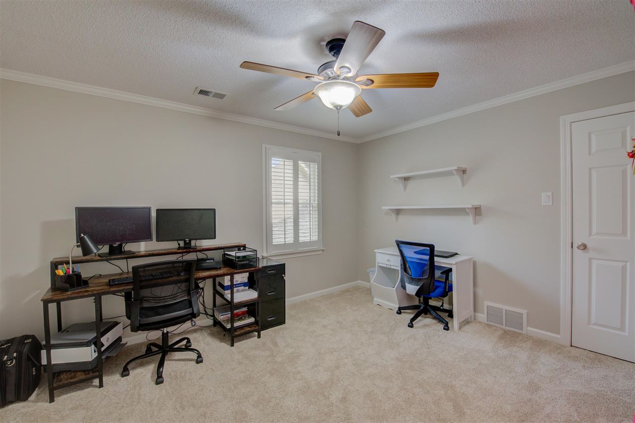 9162 Fox Ridge Road Germantown, TN 38139 - Photo 23 of 25 a view of a workspace with furniture and a window