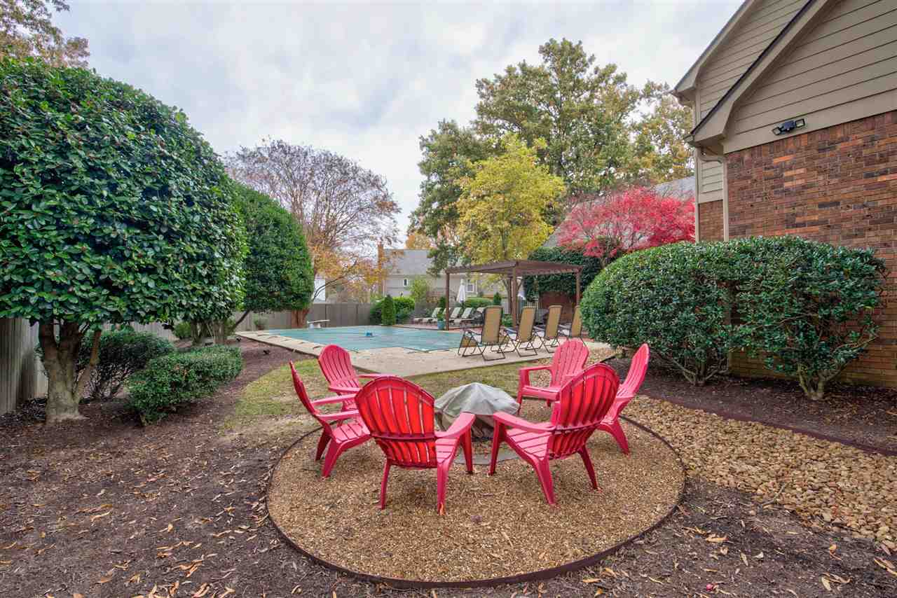 9162 Fox Ridge Road Germantown, TN 38139 - Photo 24 of 25 a view of backyard with outdoor seating and green space