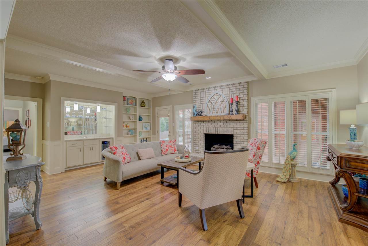 9162 Fox Ridge Road Germantown, TN 38139 - Photo 4 of 25 a living room with furniture and a fireplace