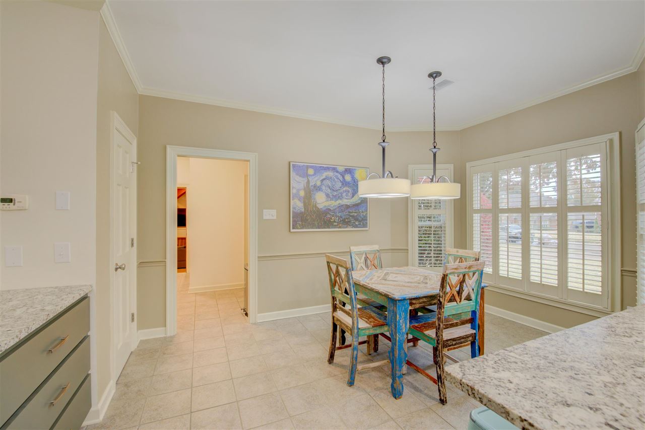 9162 Fox Ridge Road Germantown, TN 38139 - Photo 8 of 25 a view of a dining room with furniture window and outside view