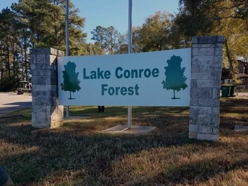 1513 Cheyenne Loop Conroe, TX 77316 - Photo 1 of 8 a view of a sign board