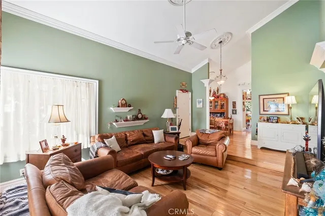 a kitchen with sink and large window