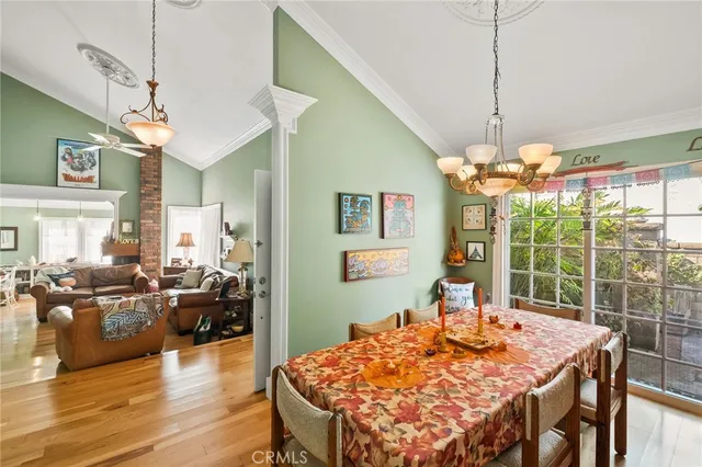 a kitchen with stainless steel appliances a refrigerator and a sink