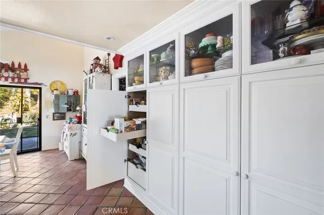a bathroom with a sink vanity mirror and toilet