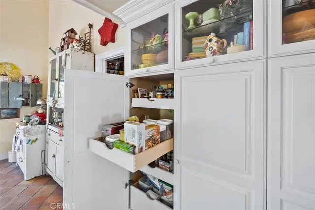 a view of a workspace with furniture and a workspace