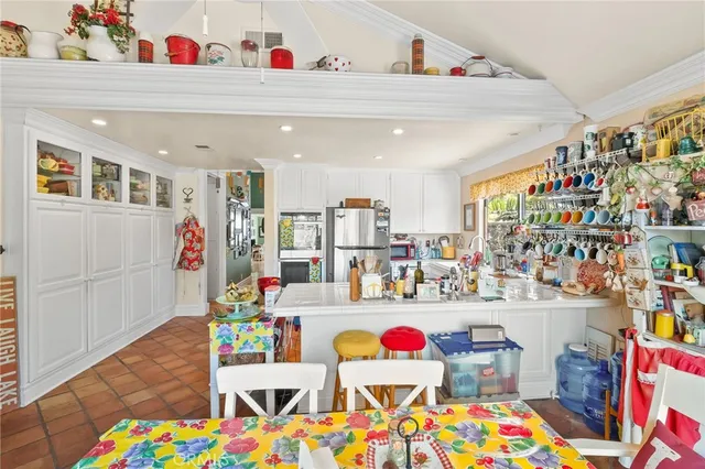 a bathroom with a sink toilet vanity and shower