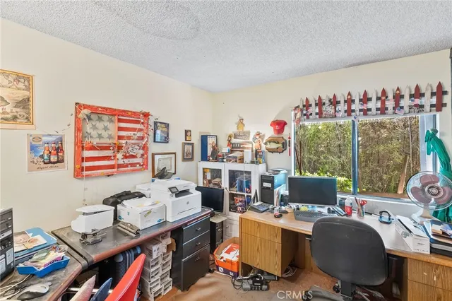 a view of a garden with a house