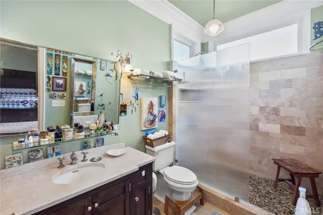 a view of backyard with seating space and trees