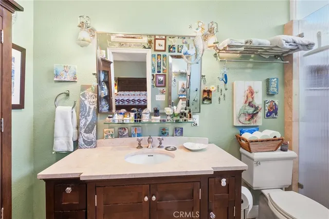 a view of a garden with a building in the background