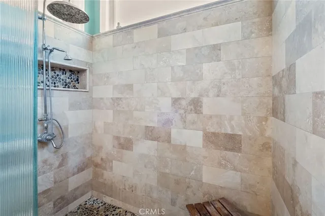 an aerial view of a house with a yard and garden