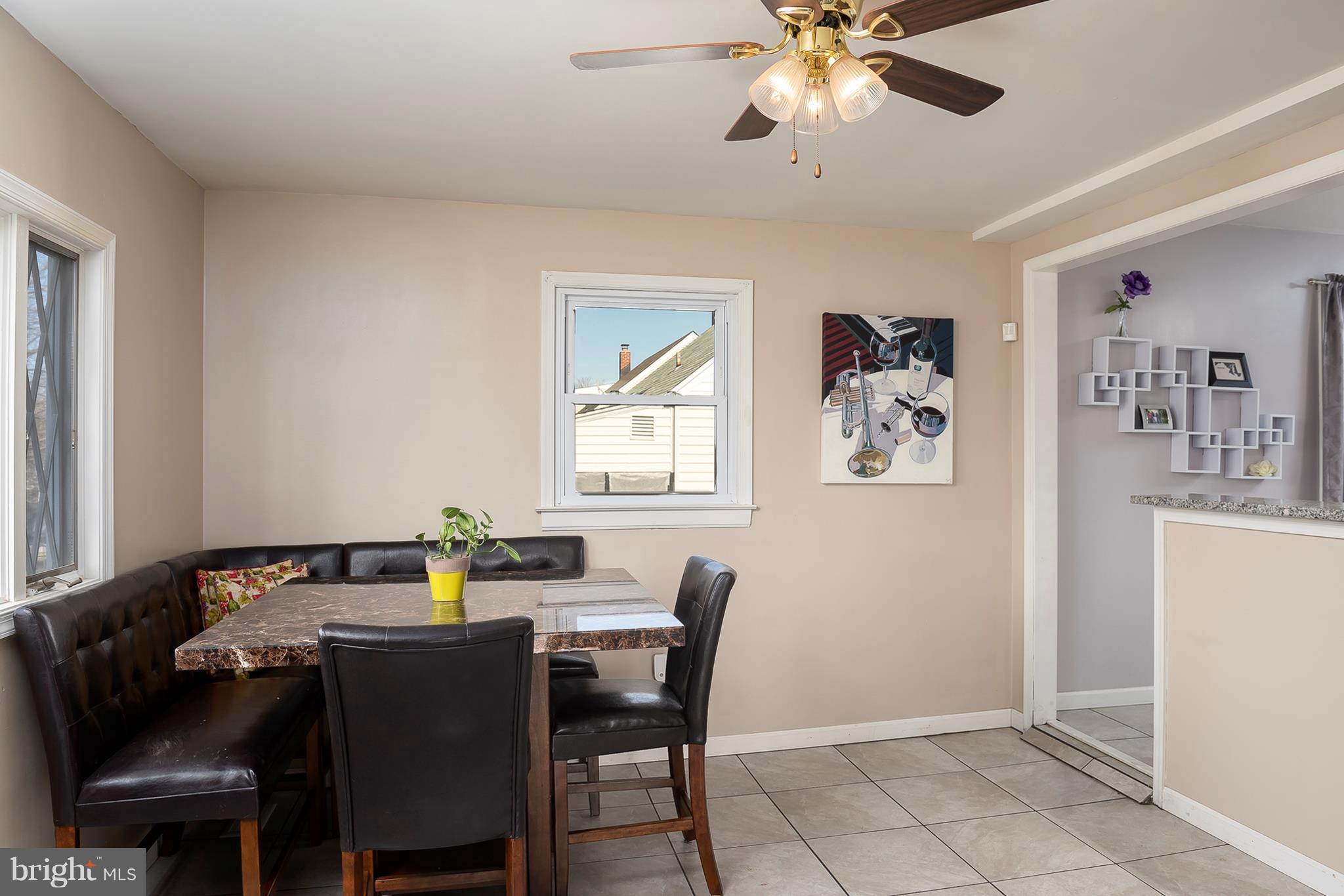 110 South Longcross Road Linthicum Heights, MD 21090 - Photo 16 of 31 Expanded Morning Room w/Tiled Floor & Ceiling Fan