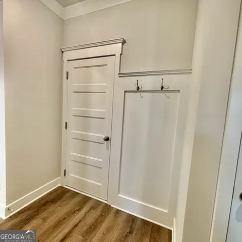 a front view of a house with a yard table and chairs