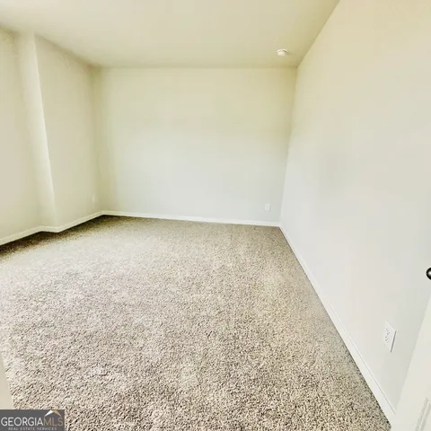 a house view with a backyard space