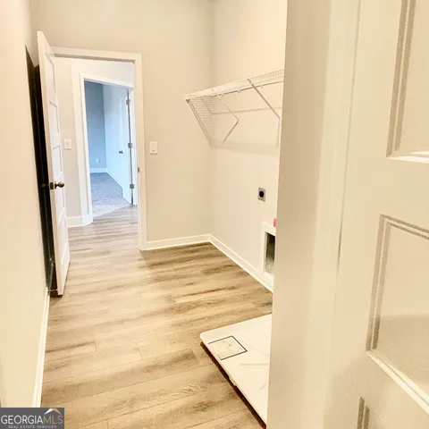 a view of a house with swimming pool and a yard