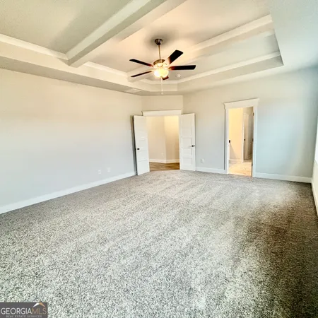 a view of street with a small yard