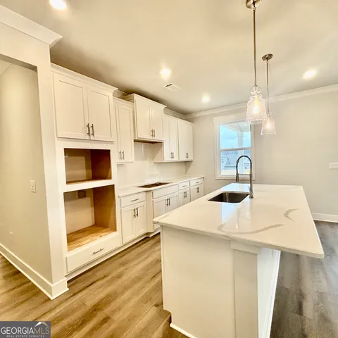 a bathroom with a toilet and a bath tub