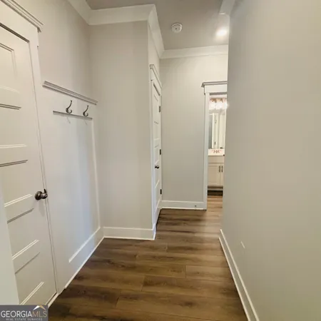 a spacious bathroom with a double vanity sink and a mirror
