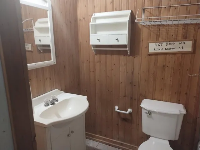 a view of storage and utility room with racks on the wall