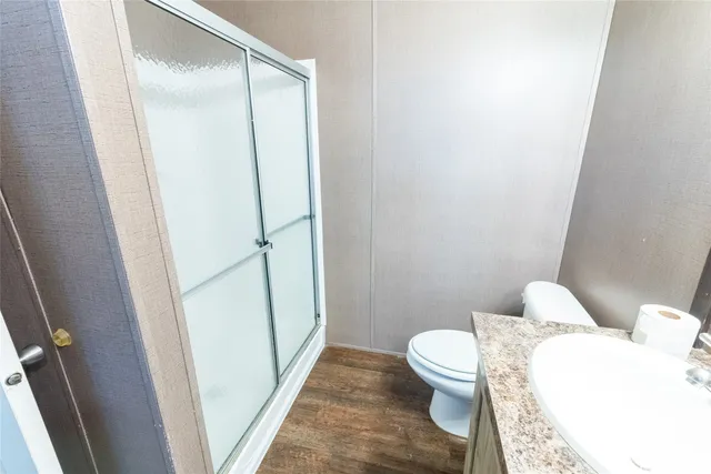 a view of room with window and ceiling fan