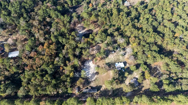 a view of a house with a tree