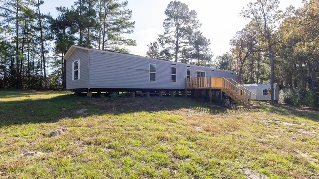 a house with trees in front of it