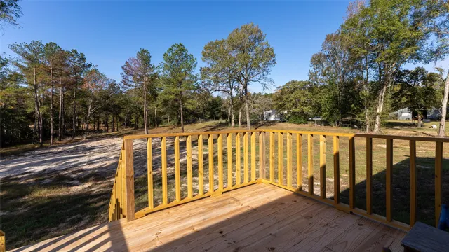 a view of a brick house with a large window
