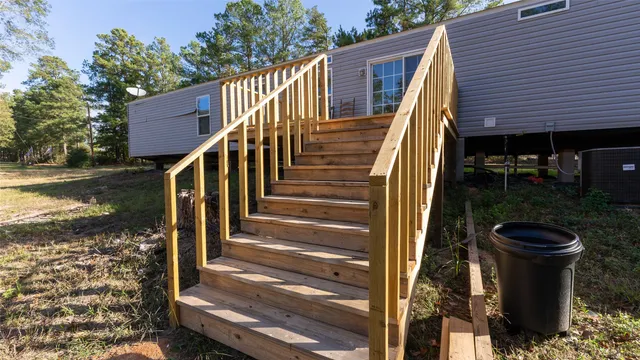 a view of deck with a bench