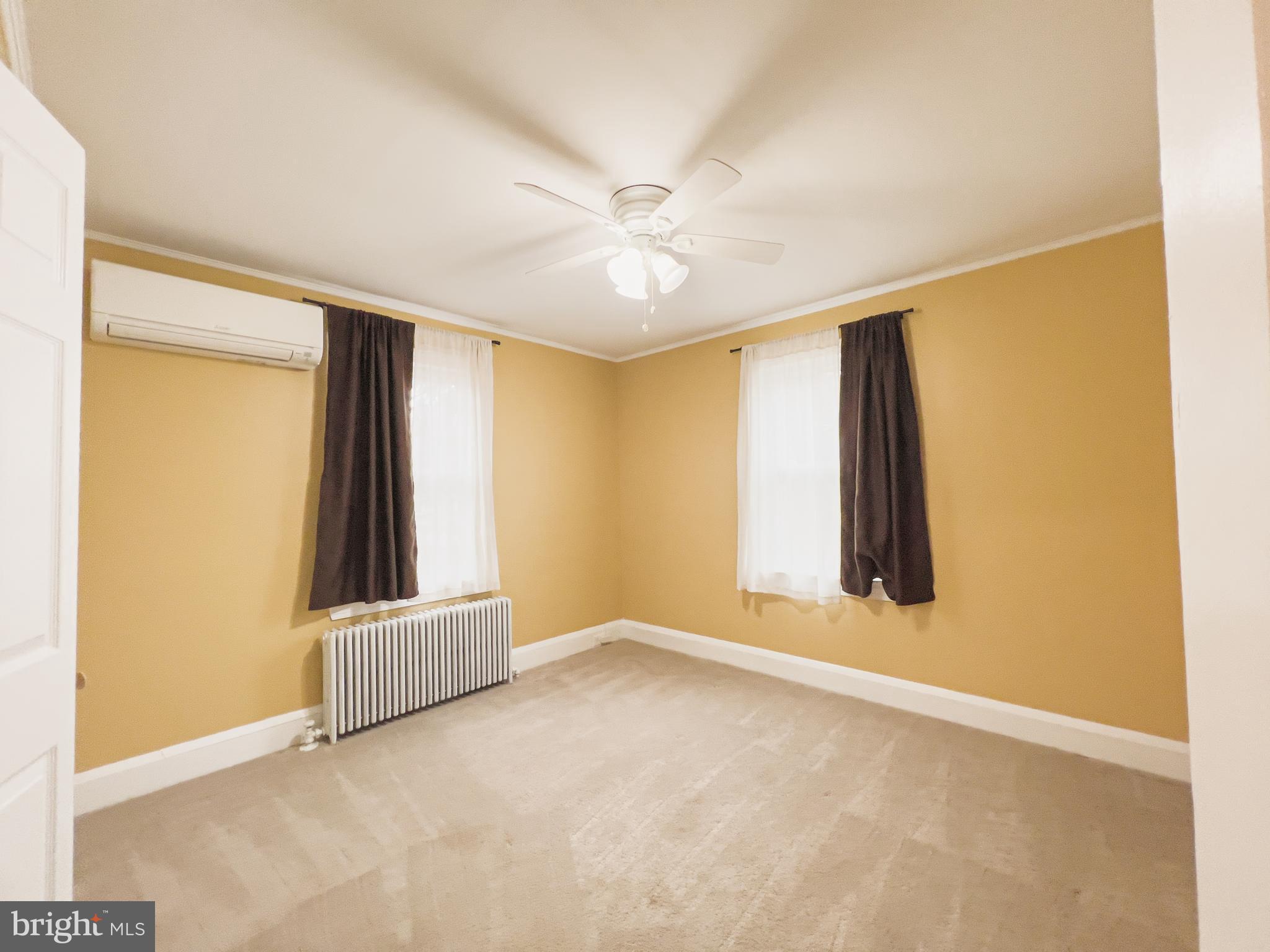 213 East Chatsworth Avenue Reisterstown, MD 21136 - Photo 12 of 23 an empty room with window