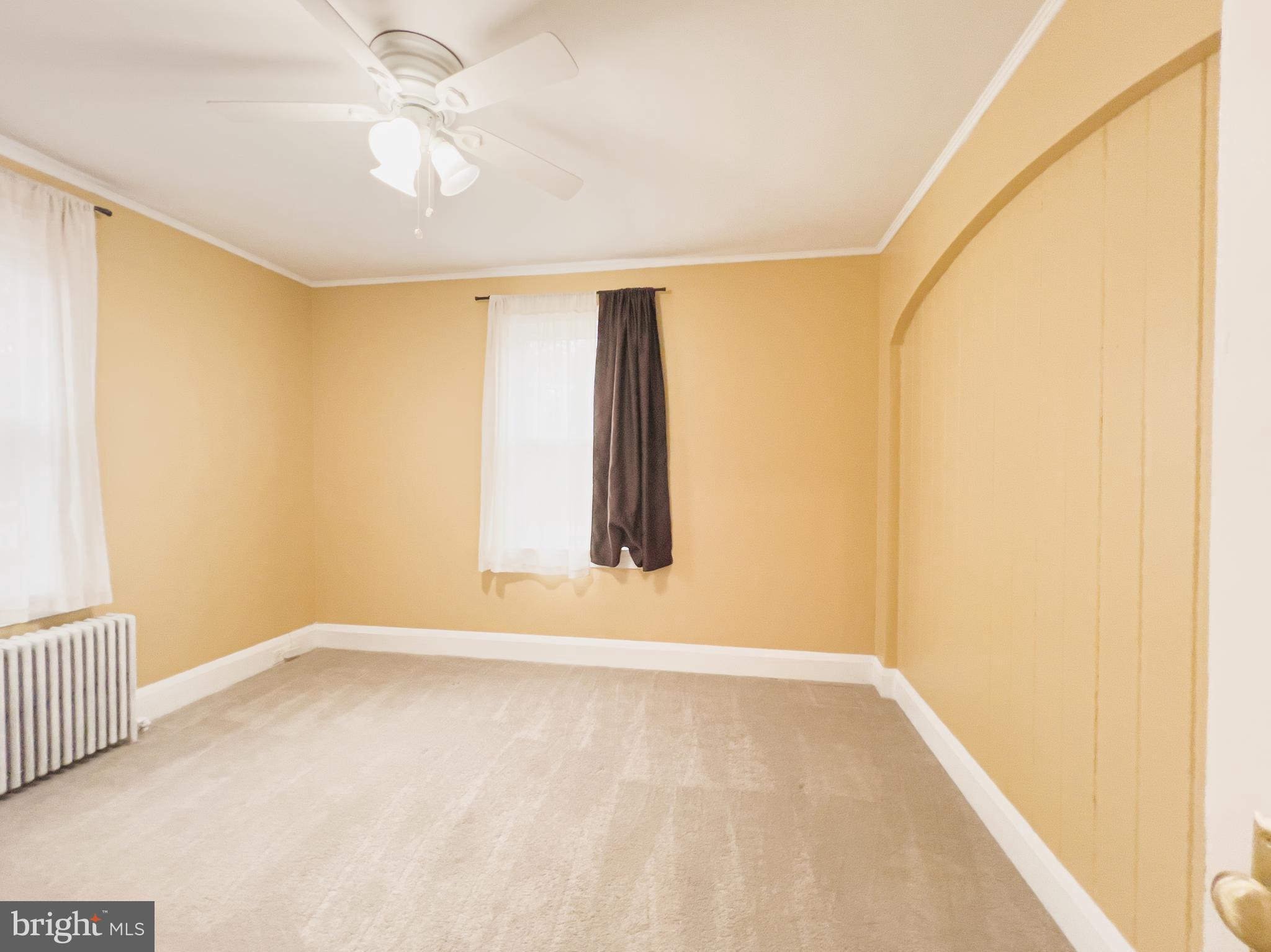 213 East Chatsworth Avenue Reisterstown, MD 21136 - Photo 13 of 23 a view of an empty room with a window