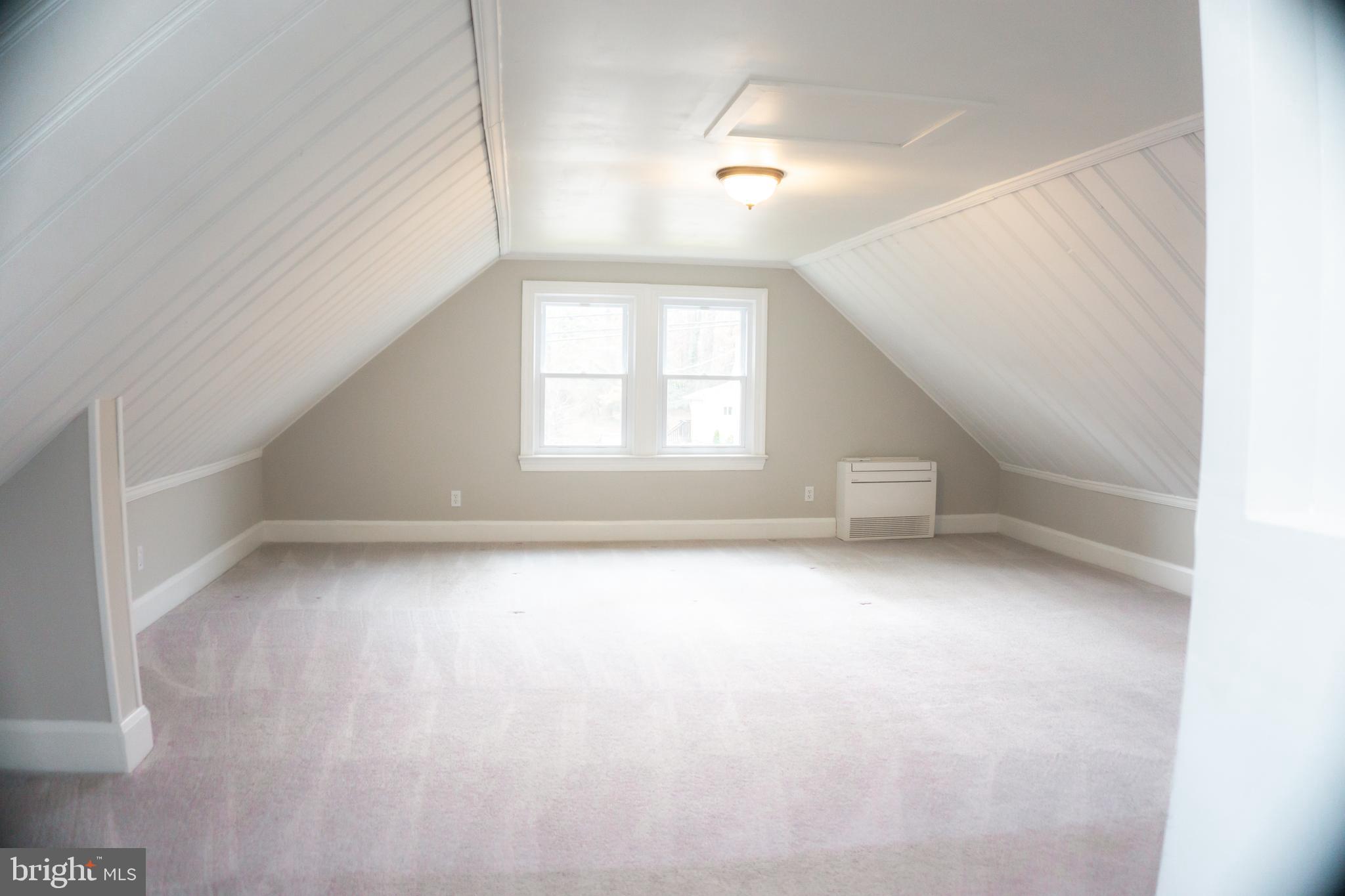 213 East Chatsworth Avenue Reisterstown, MD 21136 - Photo 5 of 23 an empty room with a window