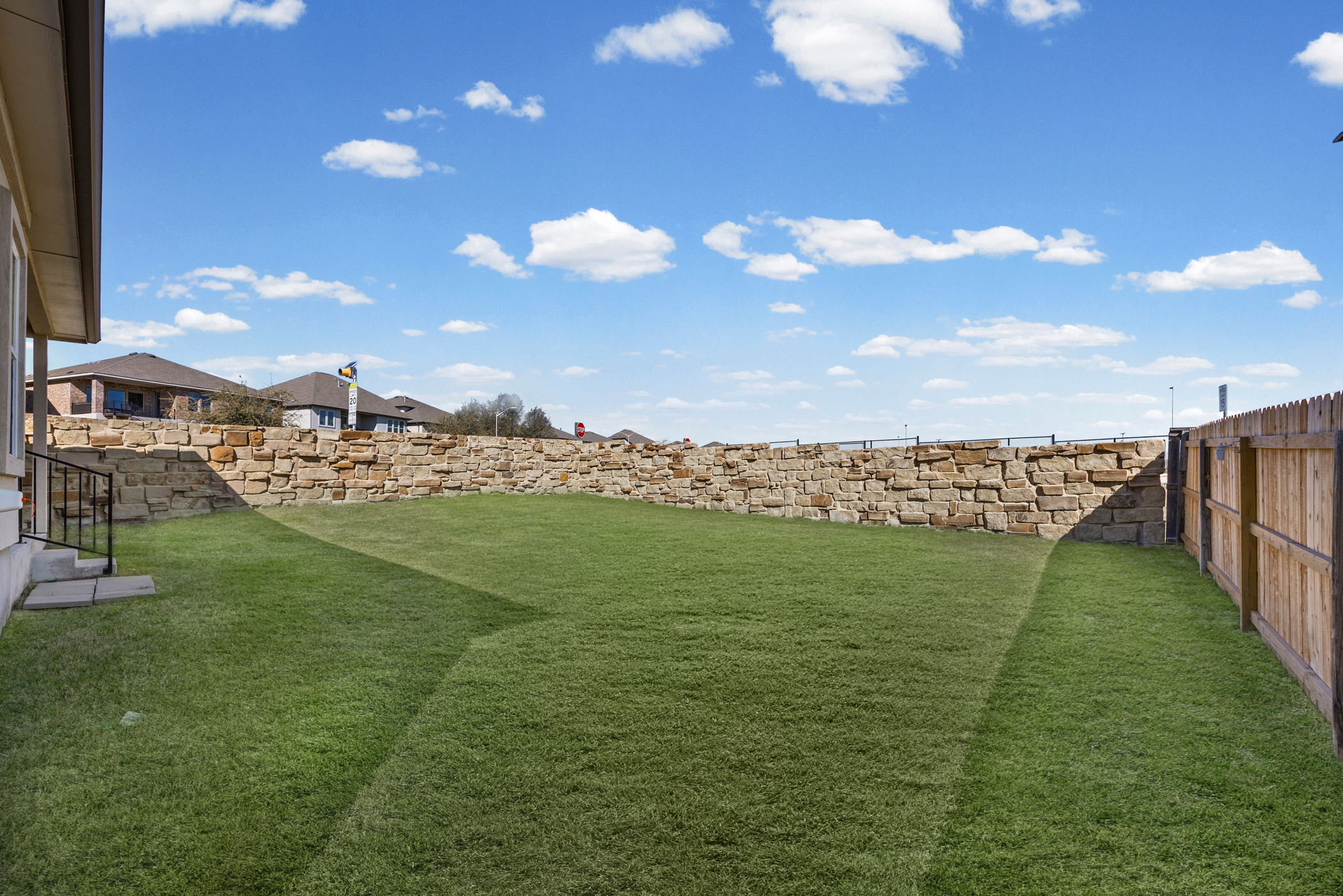 1609 Woolsey Way Leander, TX 78641 - Photo 24 of 29 Fenced backyard featuring a residential view