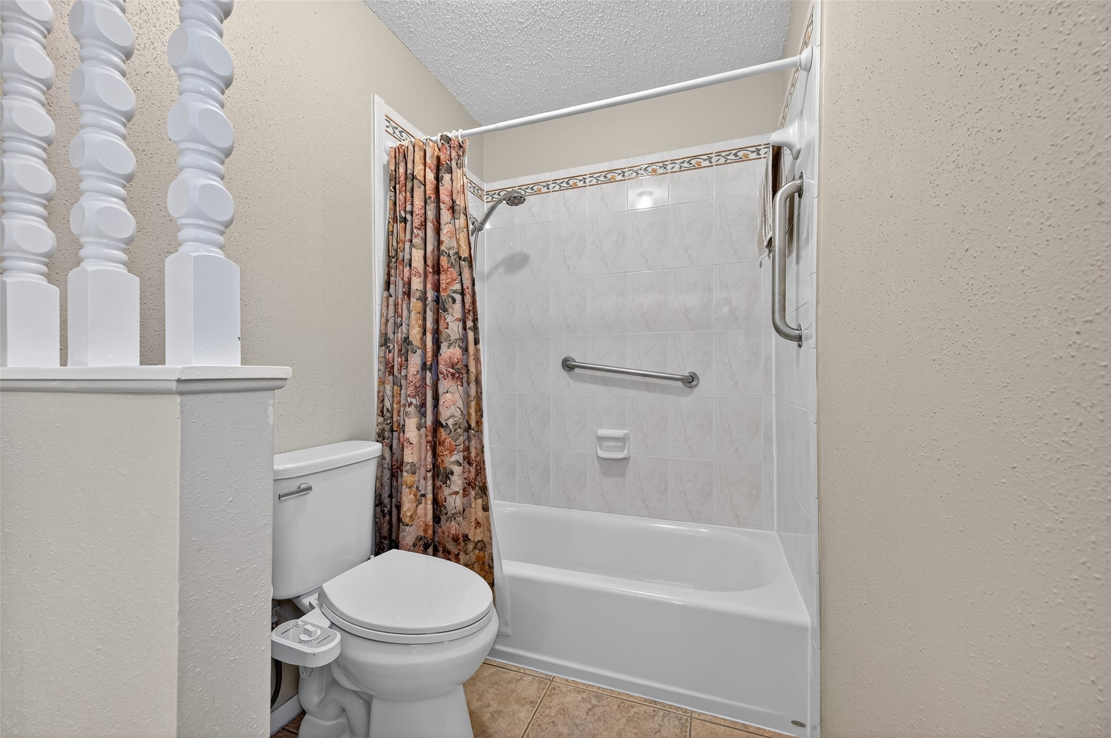 6230 Sunnygate Drive Spring, TX 77373 - Photo 32 of 40 a bathroom with a shower and a toilet