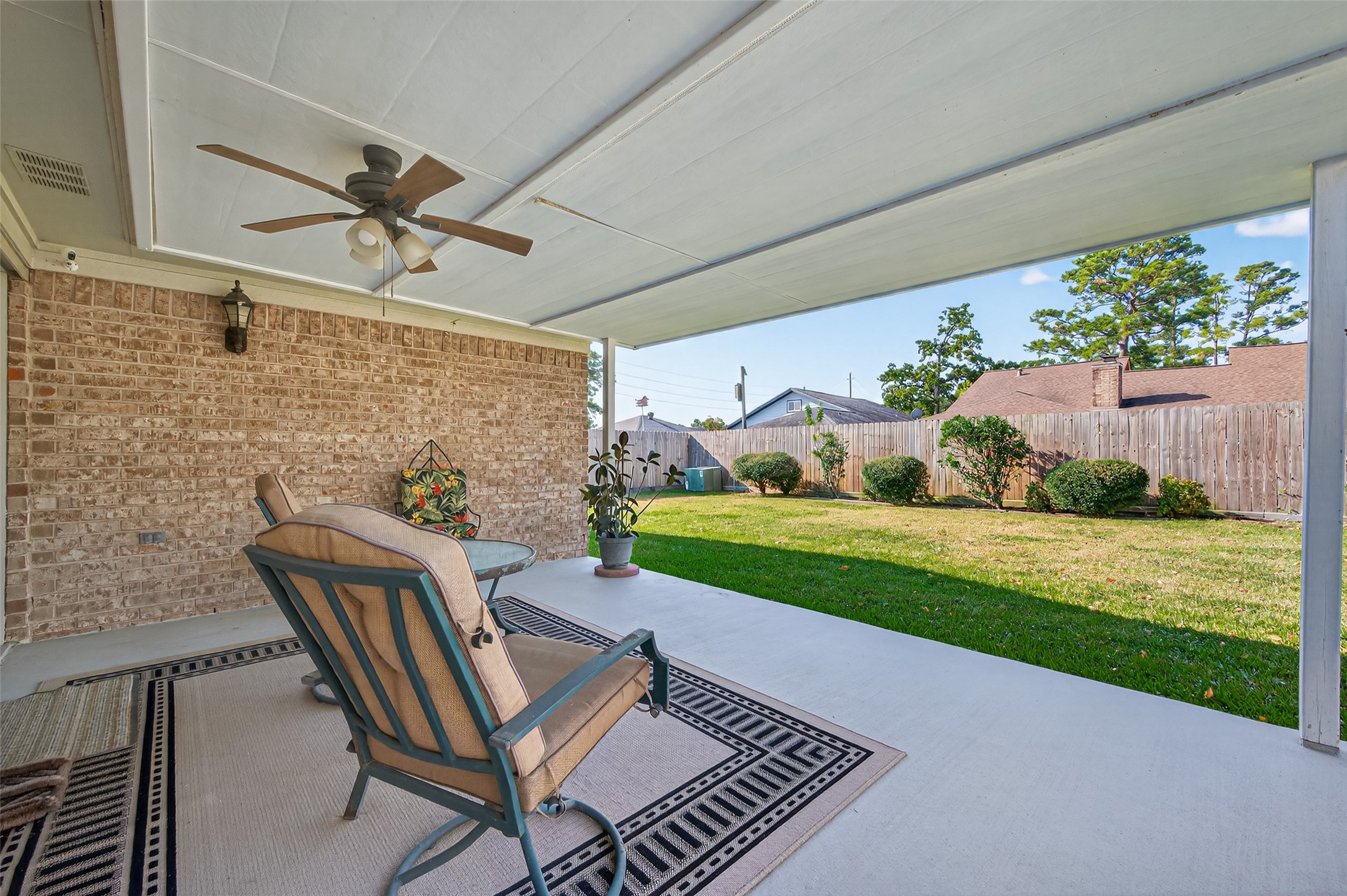 6230 Sunnygate Drive Spring, TX 77373 - Photo 34 of 40 a view of a patio with a yard