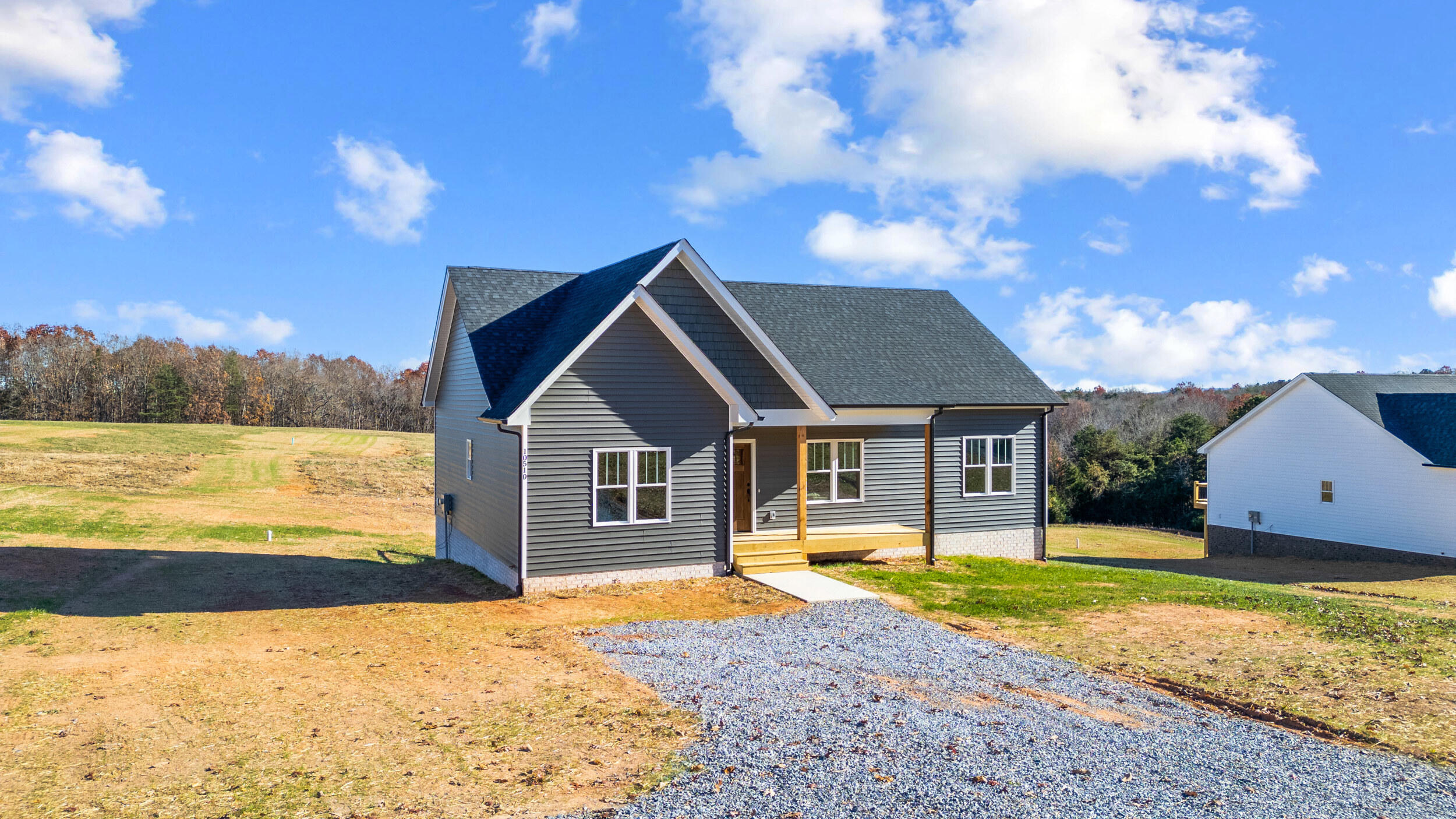 10510 Leesville Road Lynch Station, VA 24571 - Photo 49 of 60 a front view of a house with a yard and lake view